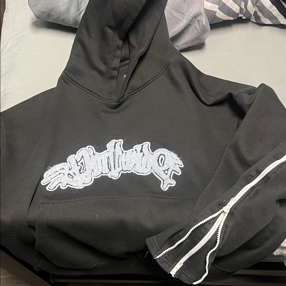Black Hoodie with White Graphic and Zipper Detail